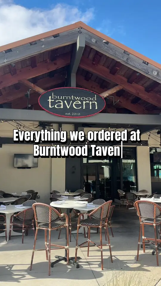 Burntwood Tavern in Fort Myers showing food, chicken sliders on biscuit, drink, video by ohheyswfl on TikTok