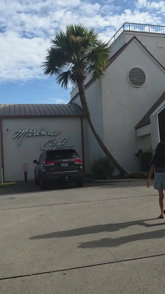 Cafe Destin in Destin showing review, waterfront setting, harbor views, dinner, live music, video by musebymw on TikTok