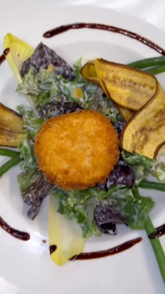 Cafe Maxx in Pompano Beach showing food, fried goat cheese salad, video by Cafe Maxx on Facebook
