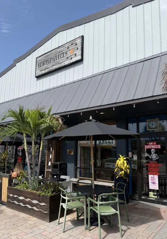 Cafe Surfinista in Cocoa Beach showing cafe visit, review, video by sam.romanosky on TikTok