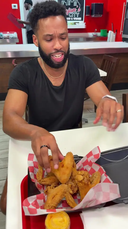 Cajun's City Seafood and Wings Atlanta in Mableton showing review, buttery crab legs, juicy turkey necks, crispy fried chicken wings, golden catfish, cajun shrimp fried rice, video by lifeofbrob on TikTok