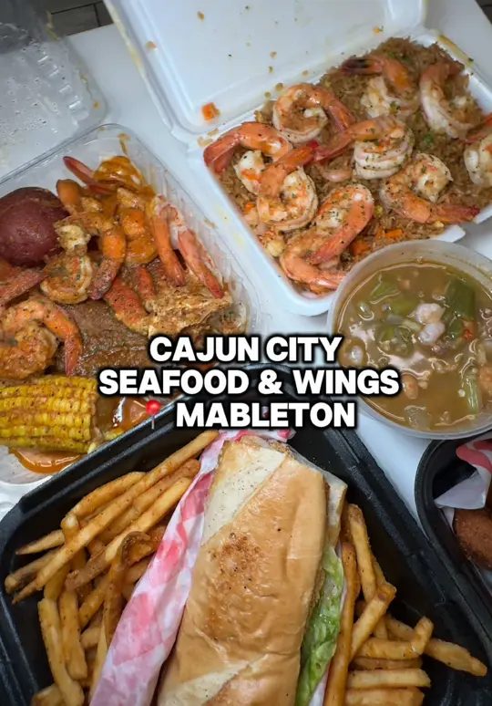 Cajun's City Seafood and Wings Atlanta in Mableton showing visit, review, seafood gumbo, city box mild, fish po’boy, trio box spicy, video by twocentsliyah on TikTok