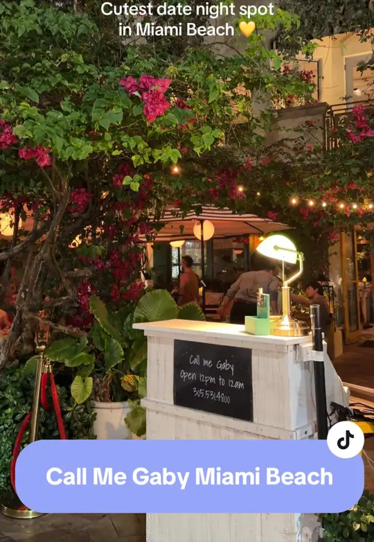  in Florida showing review, italian restaurant, pinsa romana pizza, garden-style patio, cocktail lounge, date night, video by reginagmiami on TikTok