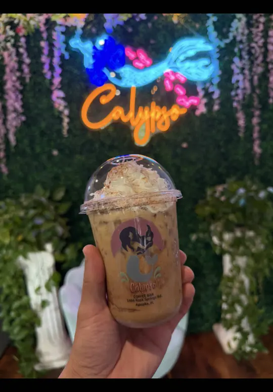Calypso Coffee Bar in Apopka showing review, visit, coffee, calypso coquito, aphrodites love potion, hades wrath, video by thegoat.dan on TikTok