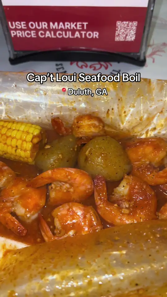 Cap't Loui Duluth in Duluth showing seafood boil, mukbang, video by ashleystastee on TikTok