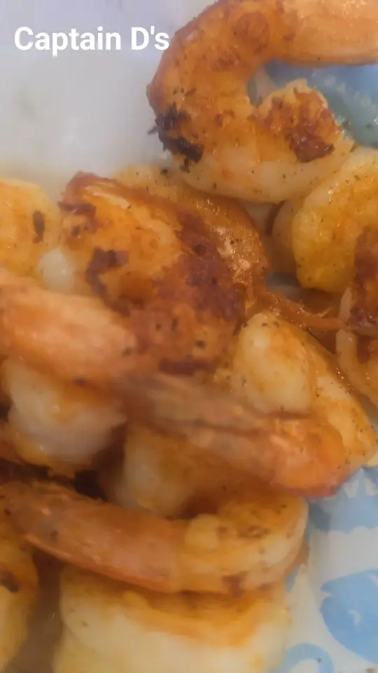 Captain D's in Columbus showing food, black chesapeake grilled shrimp, video by April Jones Young on Facebook