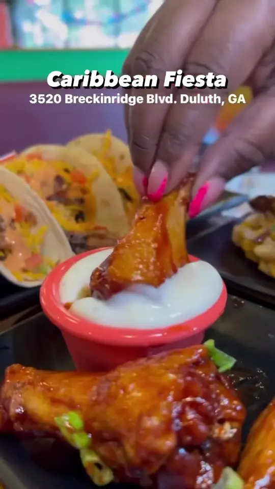 Caribbean Fiesta in Duluth showing review, jerk chicken tacos, ox tail, lamb chops, wings, video by atlantafoodguy on TikTok