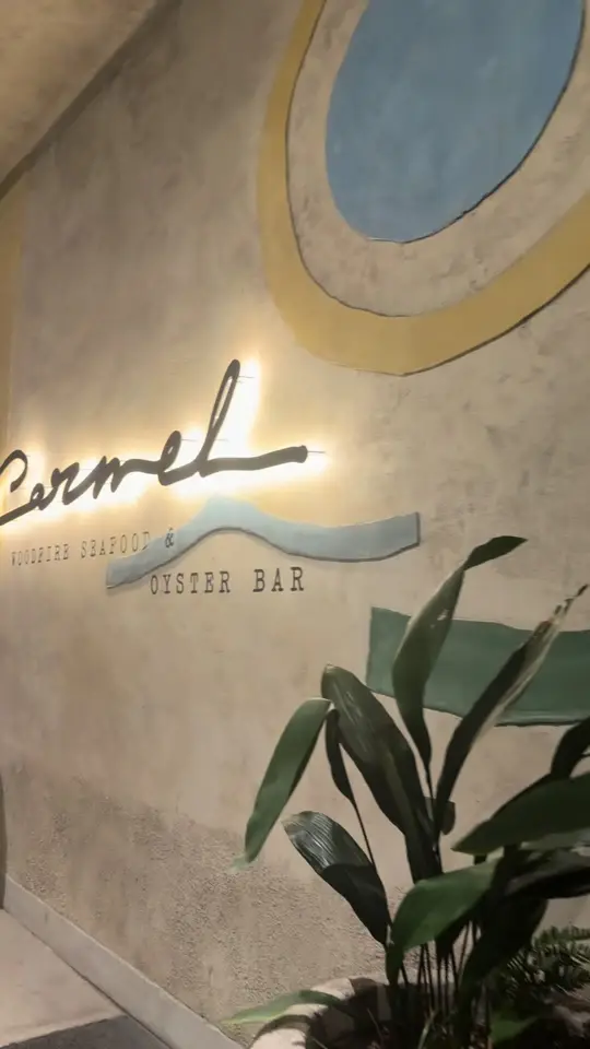 Carmel - Woodfire Seafood & Oyster Bar in Atlanta showing review, visit, video by danaeimani on TikTok