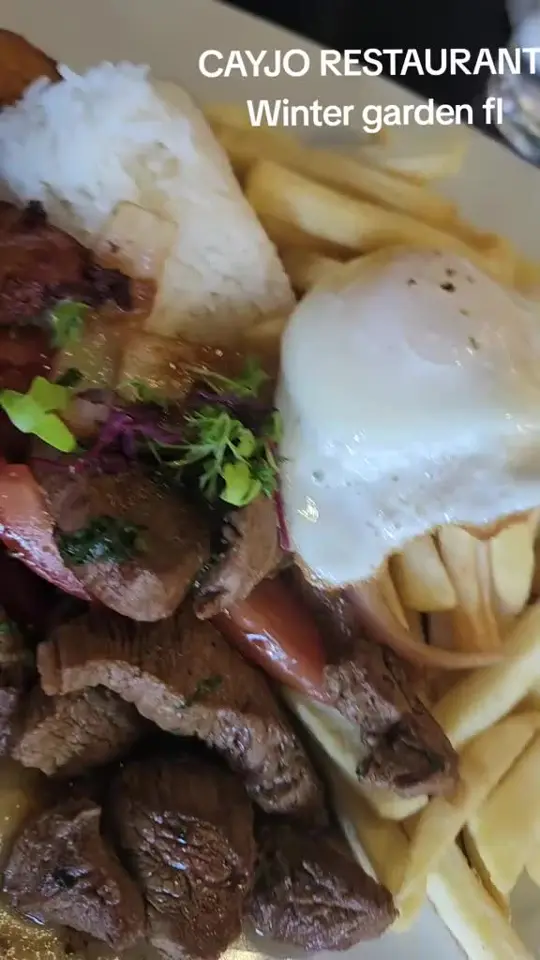 Cayjo Peruvian Cuisine in Orlando showing lomo saltado, picarones, video by betsi2870 on TikTok