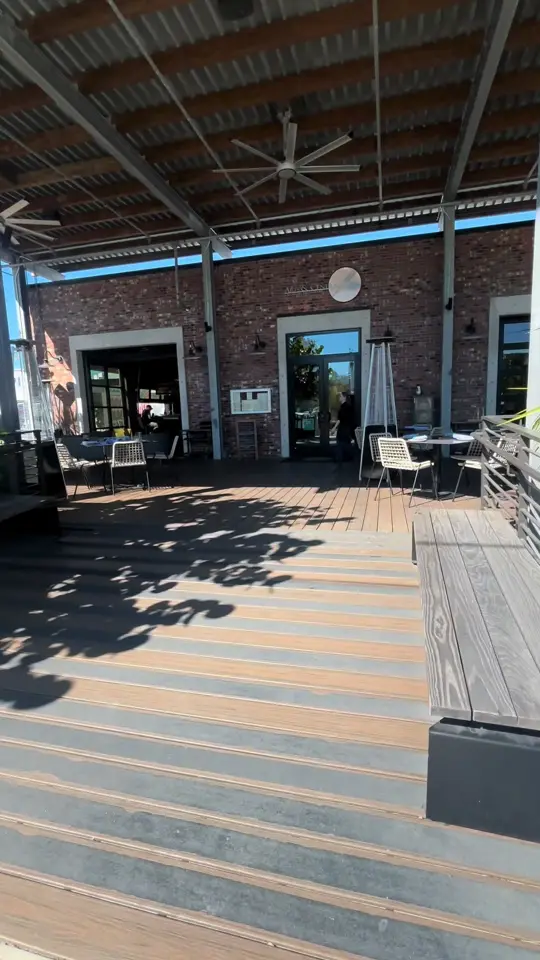 Central Cafe in Bradenton showing contemporary american cuisine, fries, live music, poetry nights, indoor/outdoor atmosphere, video by karenreinarealestate on TikTok