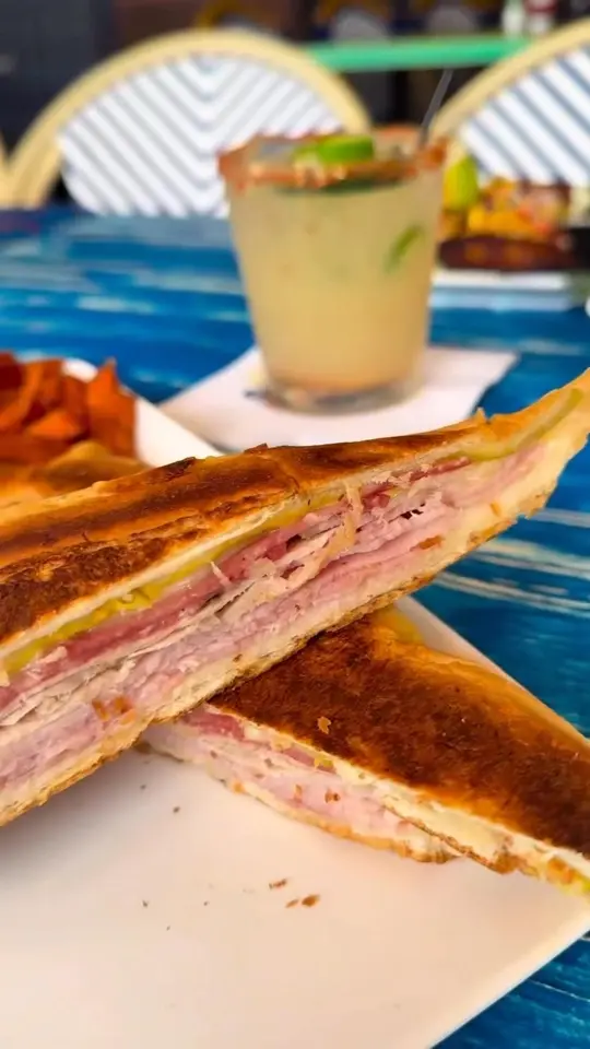 Cha Cha Coconuts - Sarasota in Sarasota showing food, cuban sandwich / food, buffalo wings / food, shrimp tacos / drink, lido's lemonade, video by Cha Cha Coconuts on Facebook
