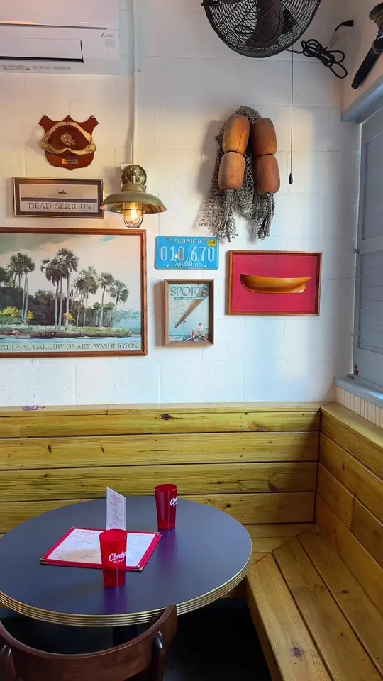 Cheeky's Fish & Raw Bar in St. Petersburg showing food, low tide, wings, fried oyster sliders, salt + vinegar chips, hush puppies, drinks, frozen espresso martini, salt + vinegar martini, video by sunkissedinstpete on TikTok