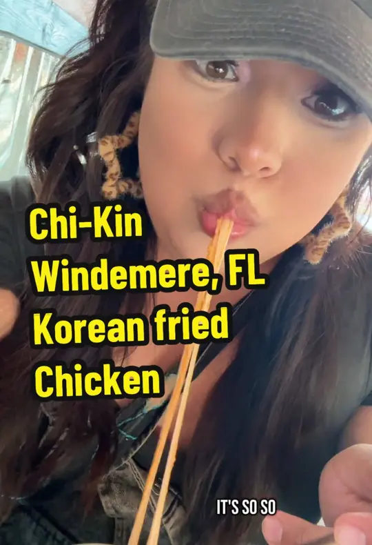 Chi Kin in Orlando showing food, wings, video by holographicmami on TikTok