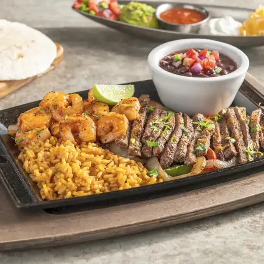 Chili's Grill & Bar in Ellenton showing food, mix and match fajitas, video by Chili's Grill & Bar on Facebook