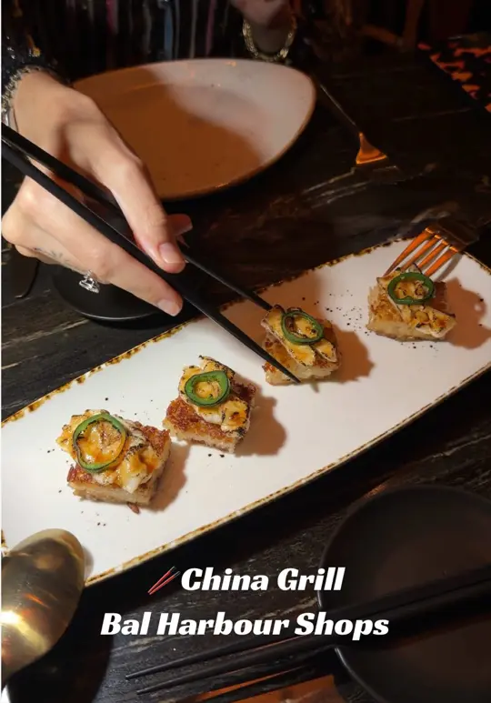 China Grill in Bal Harbour showing review, visit, food, calamari salad, video by antonio.postorino on TikTok