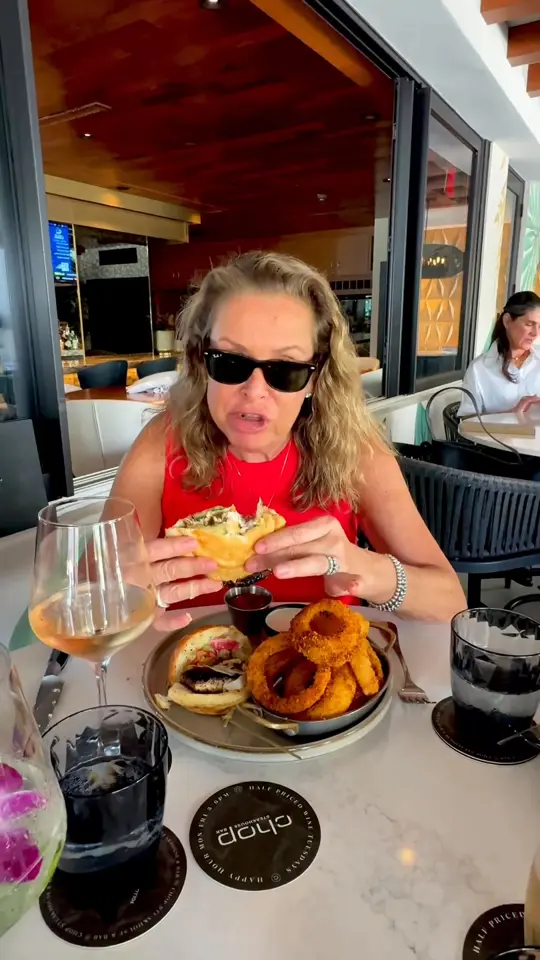 Chop Steakhouse & Bar in Miami showing food, fish sandwich, video by Pamela Gelsomini's Dish off the Block on Facebook