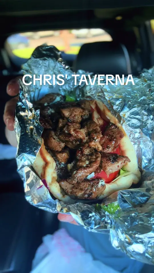 Chris Taverna in Boynton Beach showing food review, greek food, souvlaki wrap, video by martyeatsall on TikTok