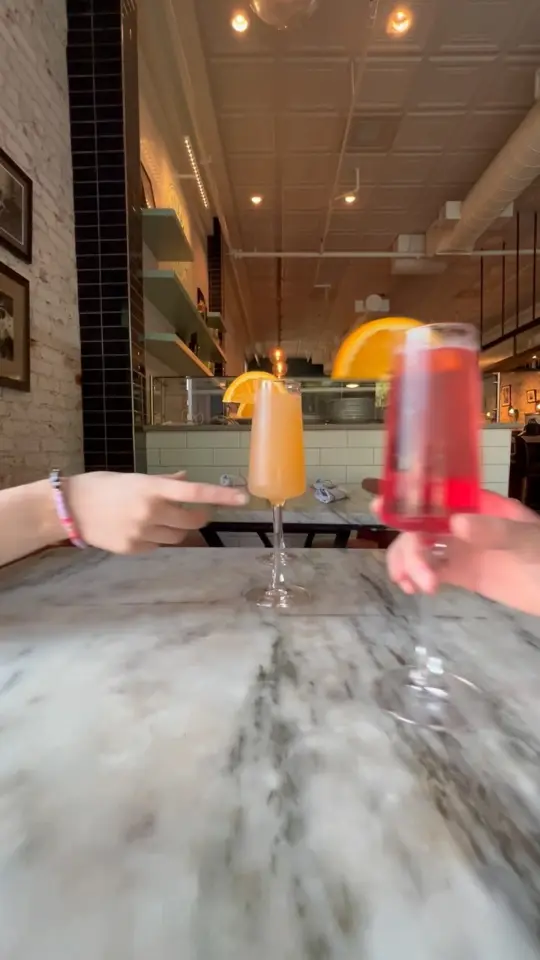 City Pharmacy in Covington showing brunch, mimosas, video by City Pharmacy on Facebook