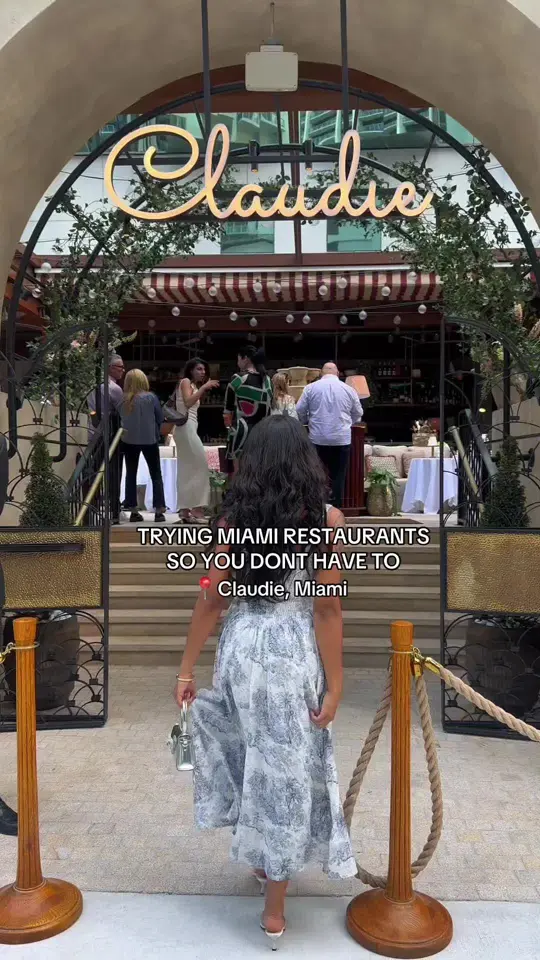 Claudie in Miami showing restaurant visit, french-mediterranean cuisine, branzino, niçoise salad, video by bellamerlot_ on TikTok