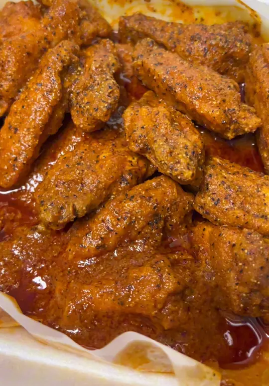 Clay's Sports Cafe in Atlanta showing food, chicken wings, video by atlantabestbites on TikTok