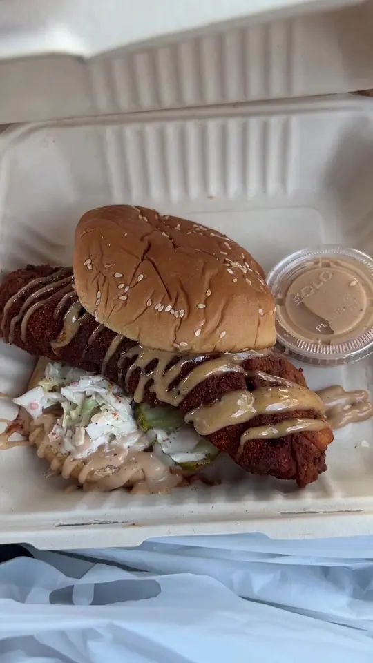 Cluck Face Nashville Hot Chicken in Boca Raton showing review, nashville hot chicken sandwich, mac and cheese, video by josiaheats on TikTok