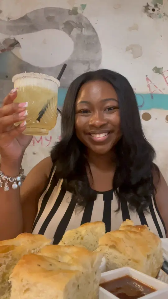 Common Restaurant in Savannah showing review, short rib ravioli, lucky club cocktail, video by Kayla Savannah & Travel on Facebook