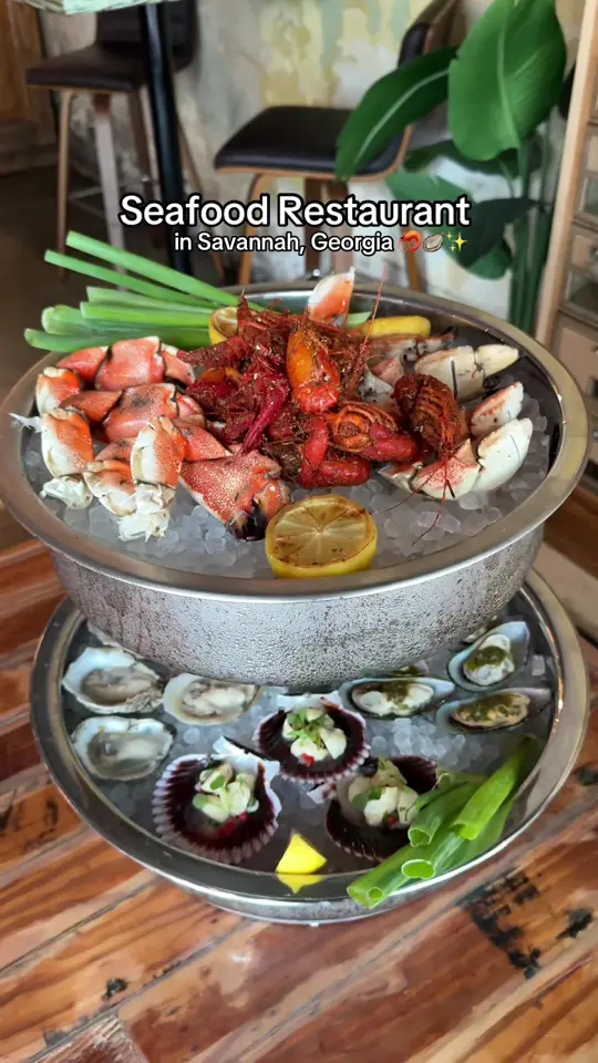 Common Restaurant in Savannah showing food, pork belly donut slides, pesto crab caprese, spicy marga, seafood tower, ceviche scallops, video by thelongweekender on TikTok