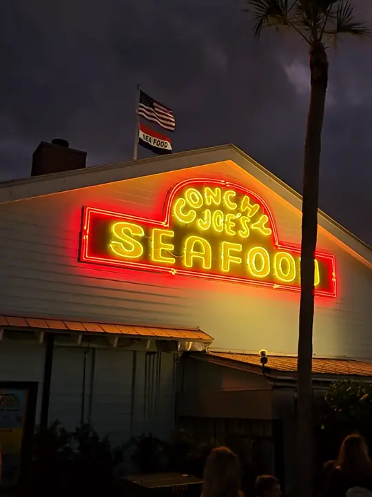 Conchy Joe's Seafood in Jensen Beach showing review, visit, atmosphere, conch fritters, gator tid bits, coconut shrimp dinner, video by jewel_saint_lee on TikTok