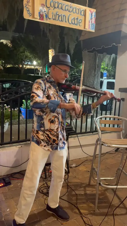 Copacabana Cuban Café in Mount Dora showing live music, violinist, video by Copacabana Cuban Cafe on Facebook