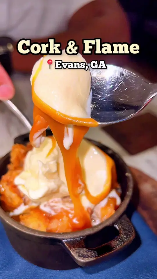 Cork & Flame in Evans showing escargot, sea bass, venison, pheasant sausage, veal, apple pie, video by thisisaugusta on TikTok