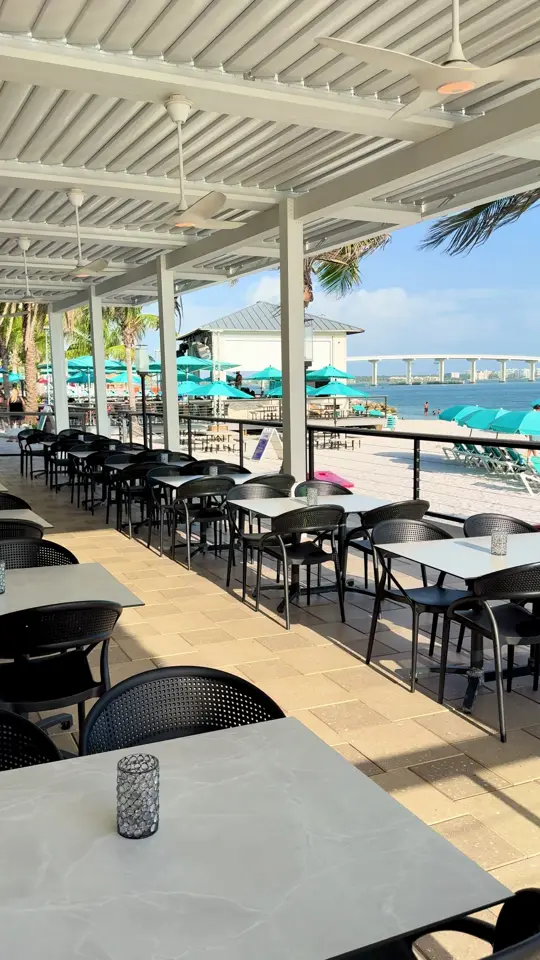 Cove Kitchen + Bar in Clearwater showing waterfront patio, dinner, fresh seafood, hand-cut steaks, appetizers, signature drink, video by shephardsresort on TikTok