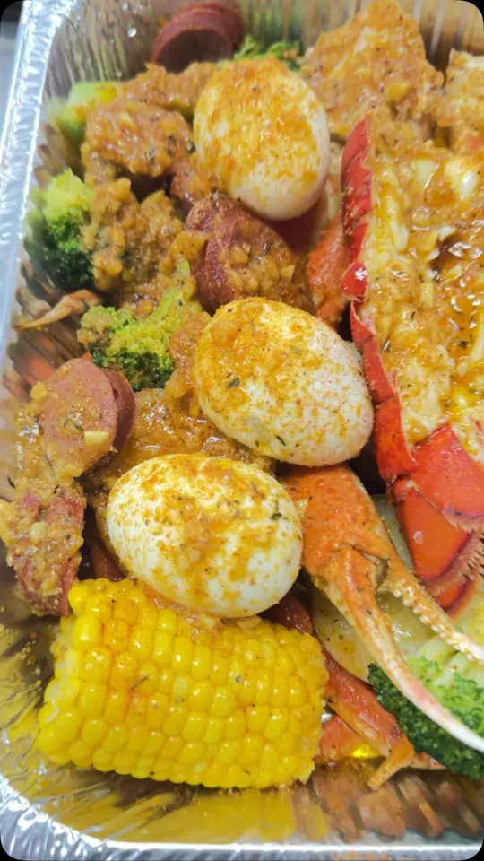 Crab & Cluck in Decatur showing food, lobster, video by Crab & Cluck on Facebook