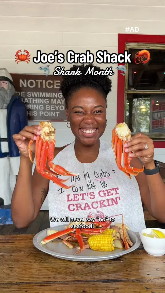 Crab Shack Restaurant in St. Petersburg showing ad, shark month promotion, seafood dishes, video by foodpeopleluv on TikTok