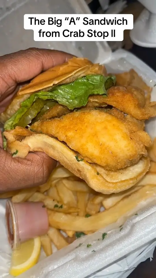 Crab Stop Ii in Daytona Beach showing food, big “a” sandwich, video by The Hughley’s on Facebook