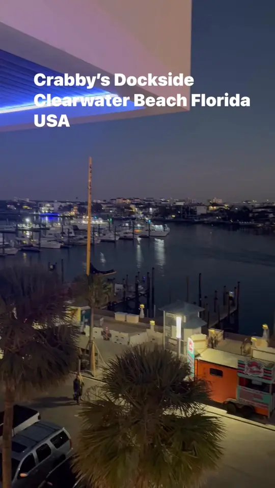 Crabby's Dockside in Clearwater showing waterfront dining, sunset view, seafood, video by Crabby's Dockside Clearwater Beach on Facebook