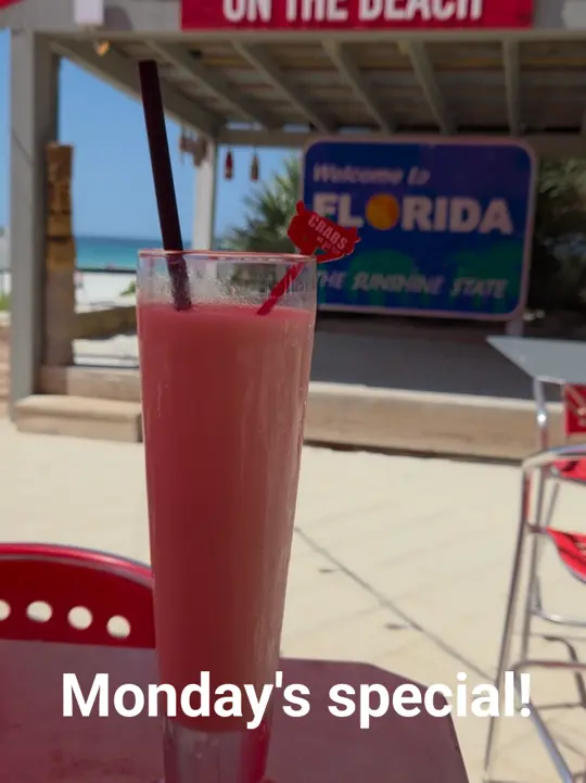 Crabs in Gulf Breeze showing drink special, bushwacker, video by crabsonthebeachpensacola on TikTok