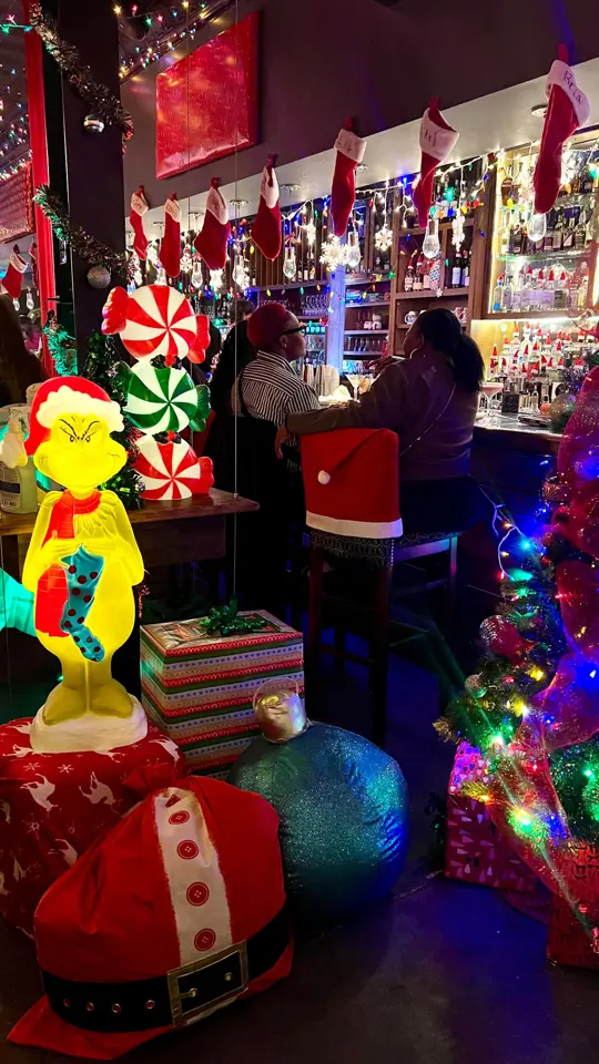Craft & Vine in Augusta showing event, holiday popup, drinks, six shots served on a christmas tree, video by Visit Augusta on Facebook