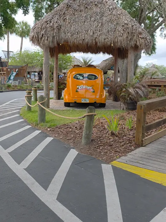 Crump's Landing in Homosassa showing review, visit, waterfront dining, tiki hut, pirate ship play area, monkey island views, video by alisonminoletti on TikTok