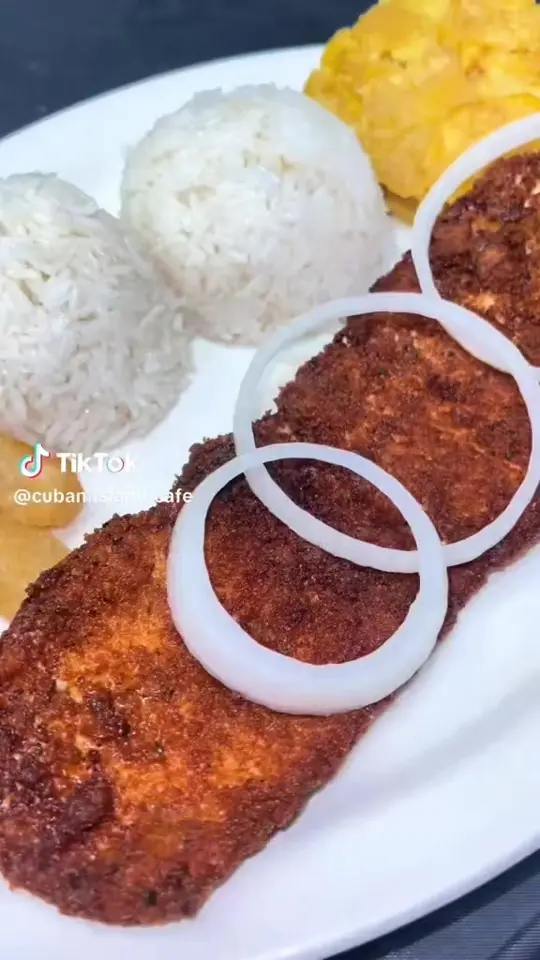 Cuban Island Cafe in Bonaire showing empanadas, sandwich, video by Cuban Island Café on Facebook