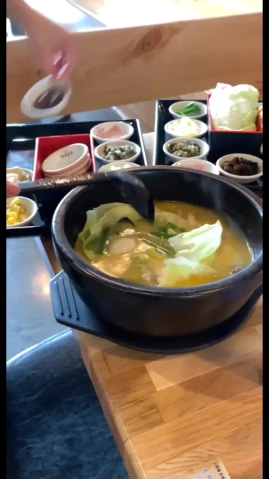 Dagu Rice Noodle in Doraville showing food, sour & spicy flavored crossing the bridge rice noodle soup with beef slices, video by eaternallyhappy on TikTok