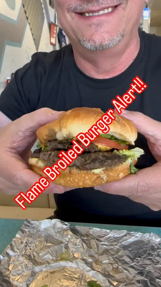 Daly's Flame-Broiled Burgers in Seminole showing burger, diner, video by Jeff and Mark Exploring on Facebook