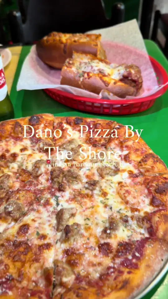 Dano's Pizza by the Shore in Indian Harbour Beach showing review, meatball sub, sausage pizza, antipasto salad, stella, video by spacecoastvibeanddine on TikTok