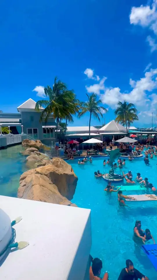 Dante's Key West Pool Bar & Restaurant in Key West showing drinks, atmosphere, pool party, video by Dante's Pool Bar & Restaurant on Facebook