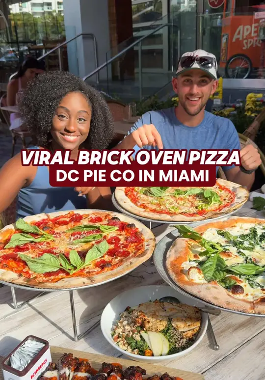 DC Pie Co. in Miami showing pizza, baked wings, cocktail, review, visit, video by zackaryeats on TikTok