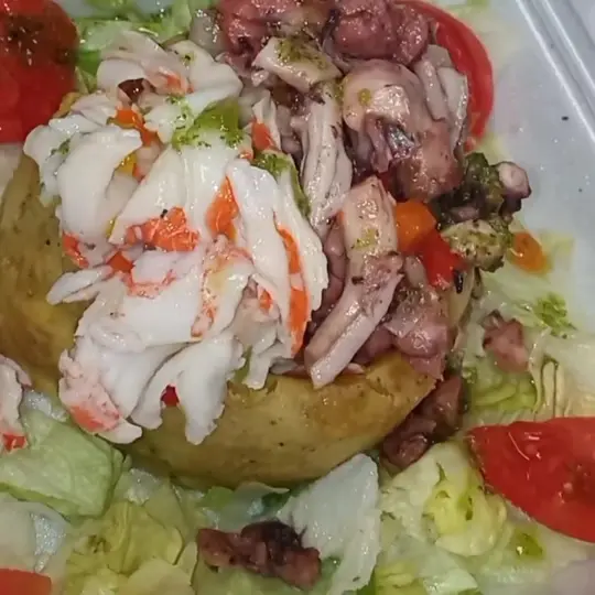 D’Corner Latin Restaurant in Richmond Hill showing food, mofongo con king crab and octopus, video by D' Corner Latin Restaurant on Facebook