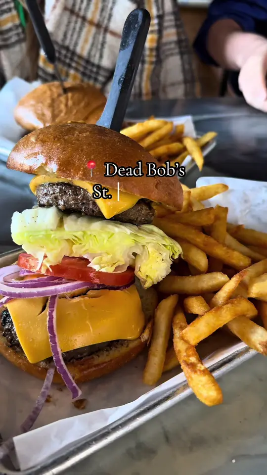 Dead Bobs in St. Petersburg showing burger, review, visit, video by emilymaker on TikTok