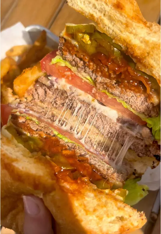 Dead Bobs in St. Petersburg showing food, niko's gyro salad, texas bob burger, bone-in chicken wings, video by eatlocalflorida on TikTok
