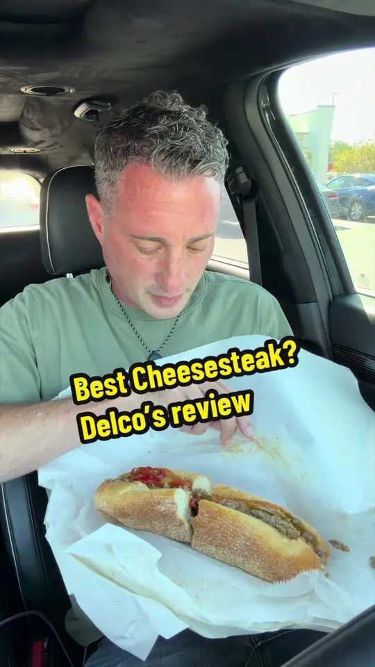 Delco's Original Steaks in Dunedin showing review, philly cheesesteak, video by foodiejustice on TikTok