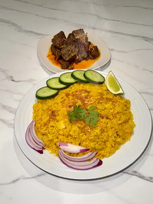 Dhaka Guys Halal Restaurant in Doraville showing food, kala bhuna, khichuri, video by Dhaka Guys on Facebook
