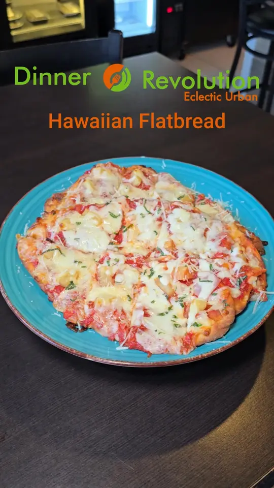 Dinner Revolution Restaurant in Vero Beach showing food, pineapple flatbread, video by Dinner Revolution on Facebook